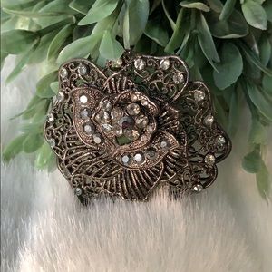 Metal rose brooch with Gunmetal rhinestones
